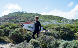 Surfer in eco wetsuit