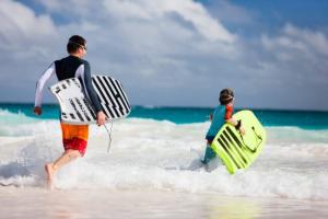 Dad and son bodyboarding