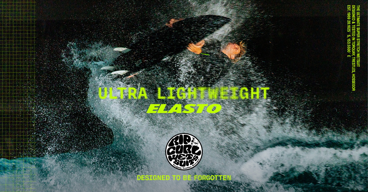 Surfer backflipping in Elasto wetsuit