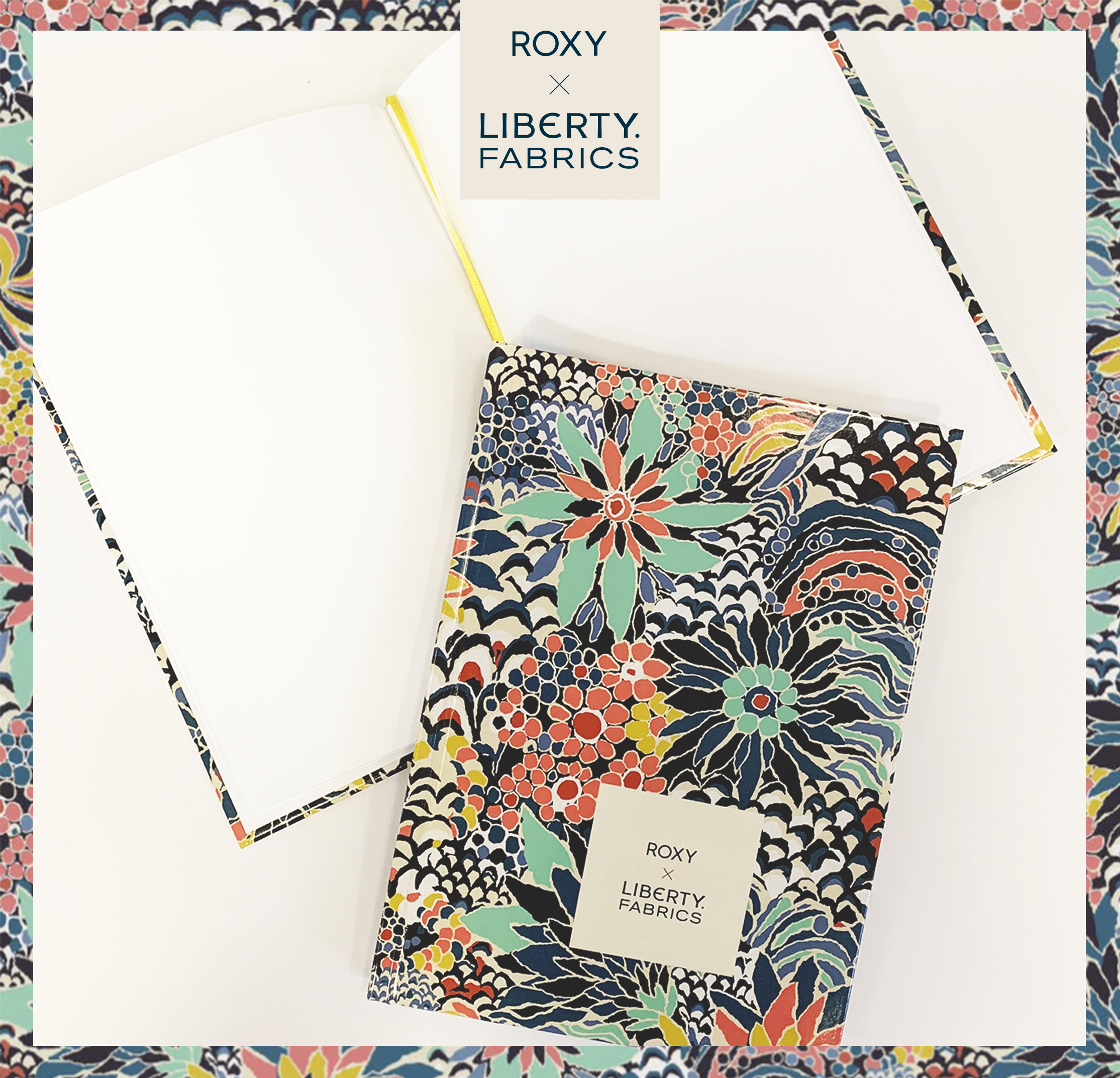 Flat lay of floral-print notebooks with a card reading Roxy x Liberty Fabrics